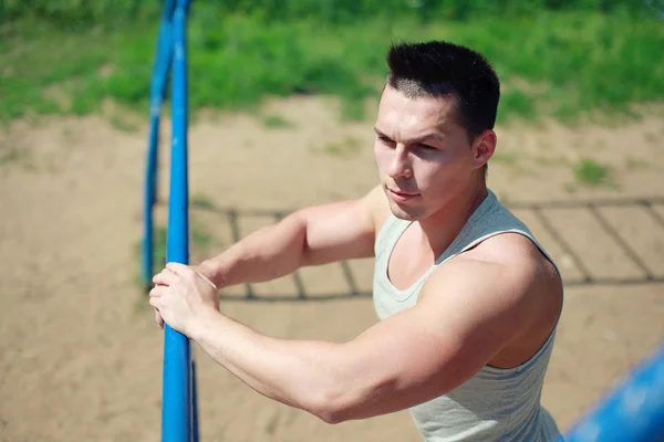 Street workout, confident sportsman — Stock Photo, Image