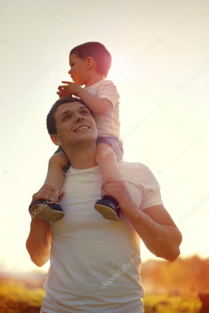 Summer lifestyle photo happy joyful father and child having fun,