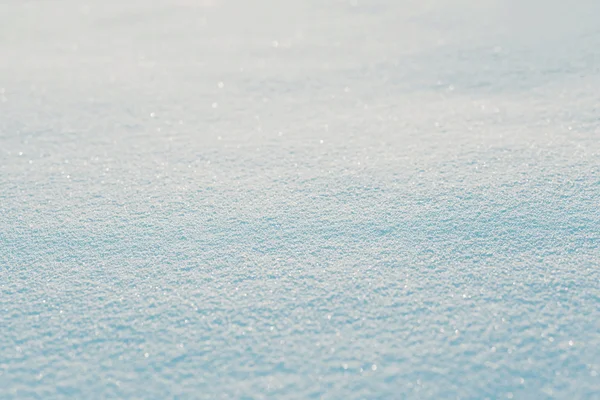 Snow texture background in sunny winter day — Stock Photo, Image