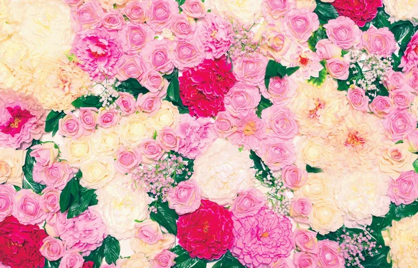 Bakgrund av många blommor, blomdekor vägg. Mjuk pasta — Stockfoto