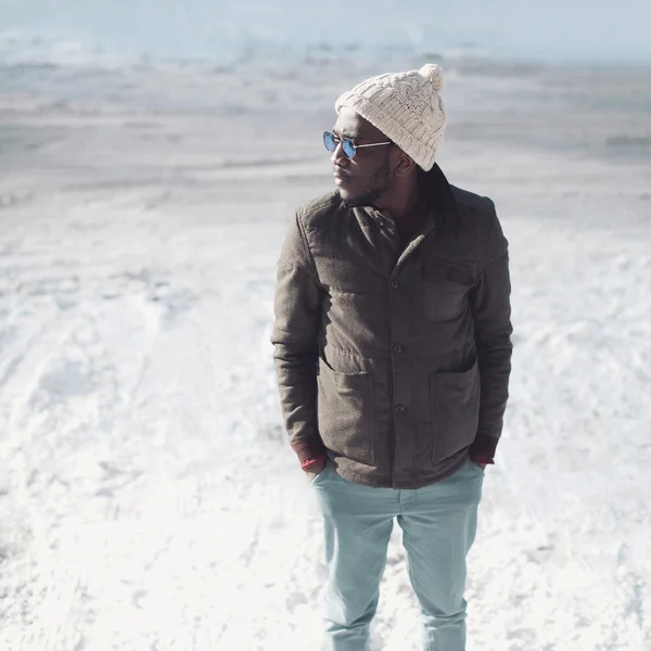 Fashion stylish young african man wearing a sunglasses, knitted — Stock Photo, Image