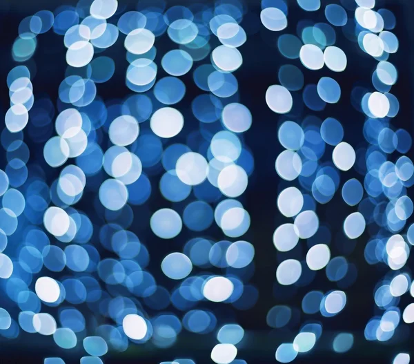 Bright blurred bokeh lights illumination of garland for design e — Stock Photo, Image