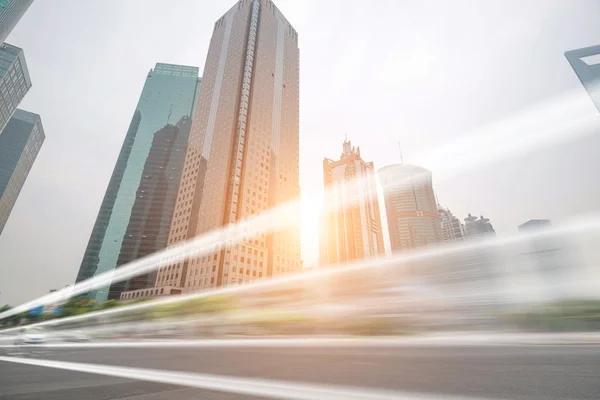 Blurred city road at sunset — Stock Photo, Image