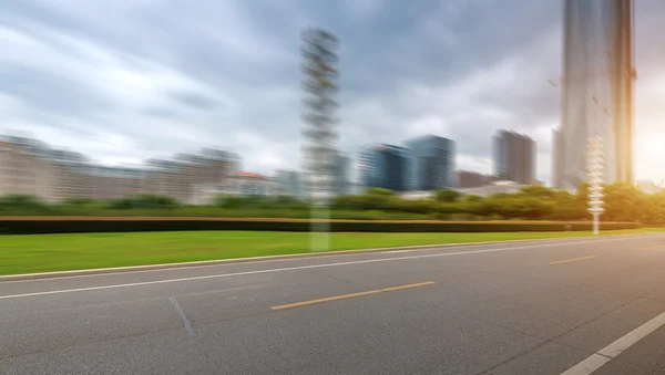 Asphalt road in modern city — Stock Photo, Image