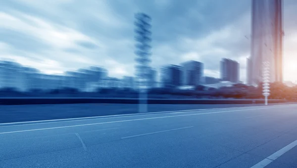 Asphalt road in modern city — Stock Photo, Image