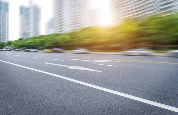 Asphalt road in modern city — Stock Photo, Image