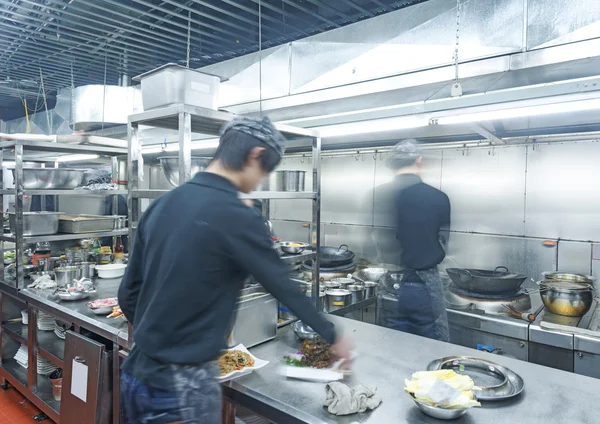 Chefs of restaurant kitchen — Stock Photo, Image