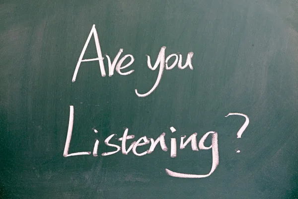 "Are you listening "on blackboard — стоковое фото