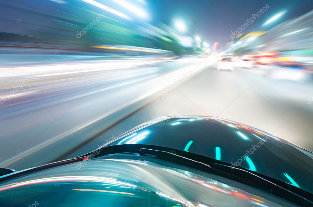 Car on road at night