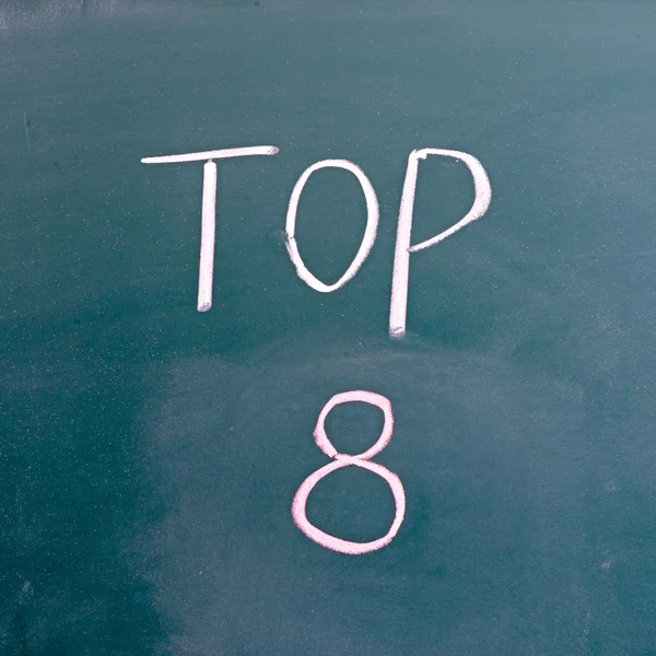 Word top 8 on blackboard — Stock Photo, Image