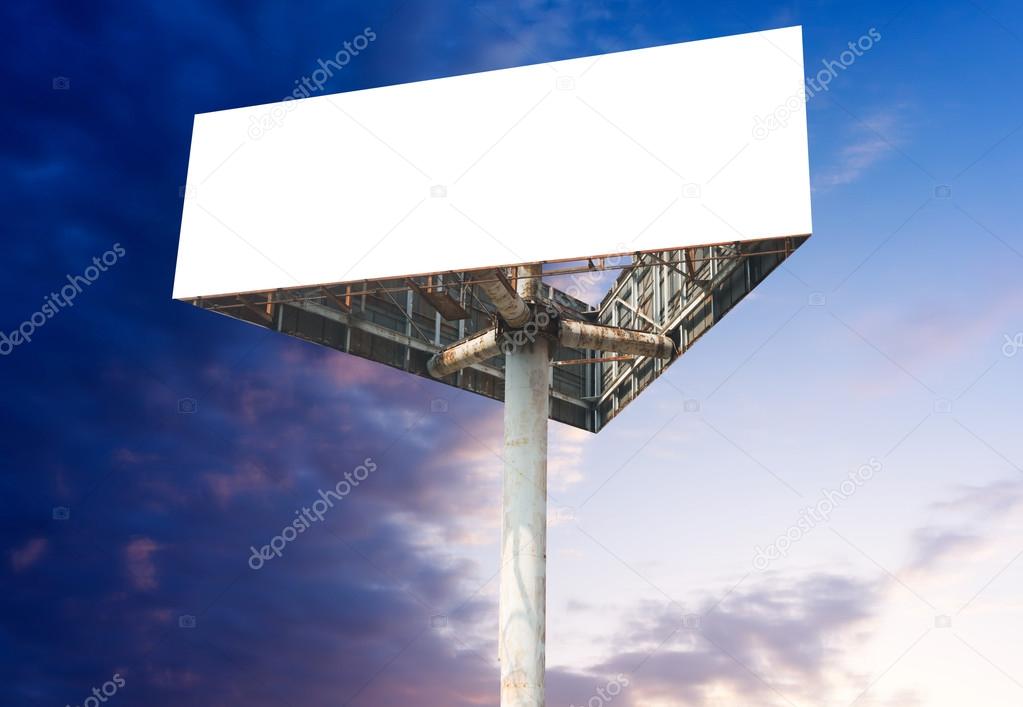Blank white billboard against blue sky