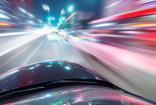 Car on road at night