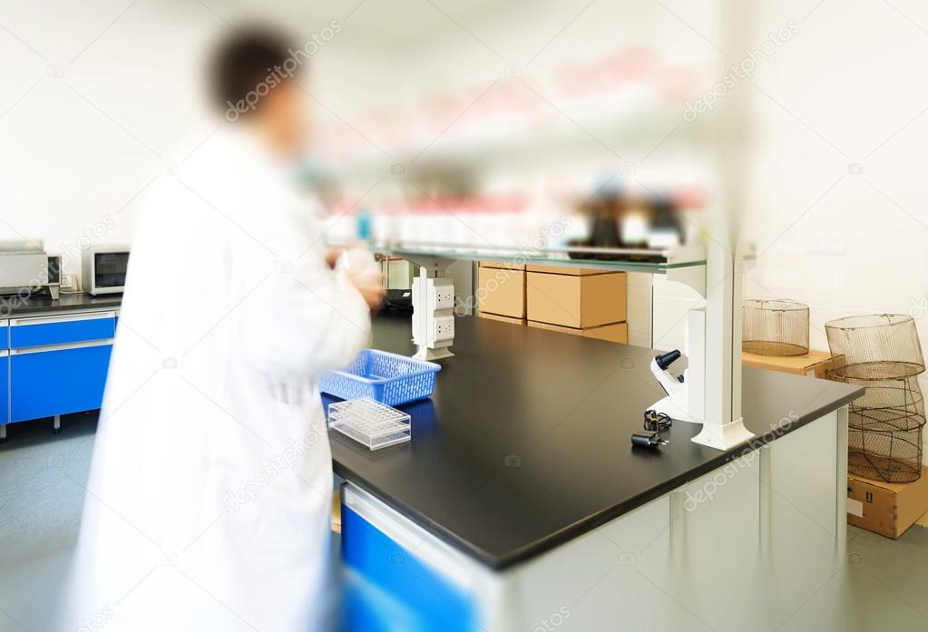 Researcher working in chemistry laboratory