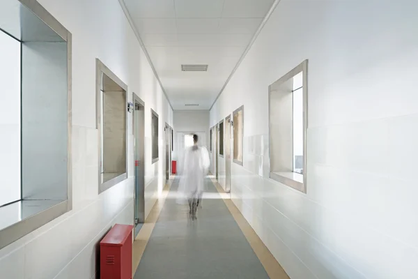 Human  walking in the corridor of hospital laboratory — Stock Photo, Image