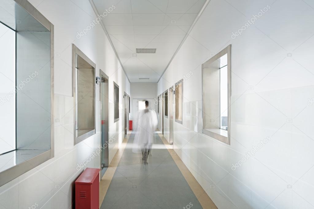 Human  walking in the corridor of hospital laboratory