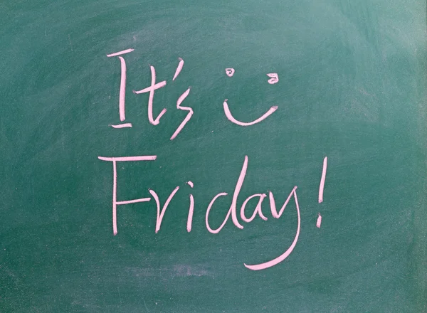It is Friday sign on blackboard — Stock Photo, Image