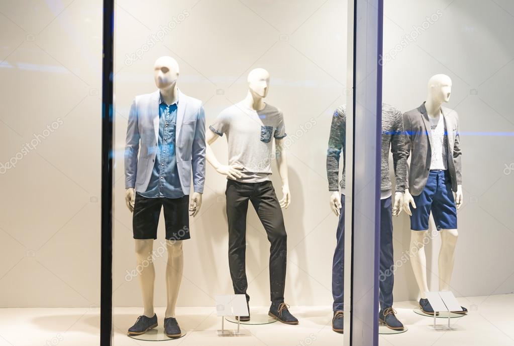 Mannequins in shopping mall — Stock Photo © zorabc #66254609