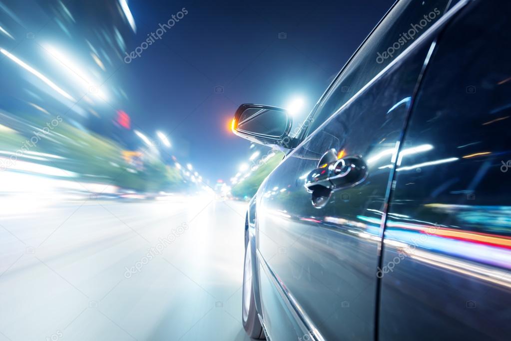 Car on road at night