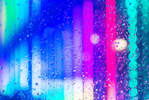 Wet window with the background of the night — Stock Photo, Image