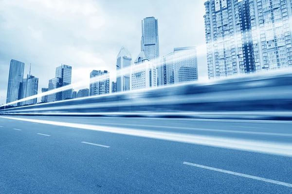 Light trails on the modern building — Stock Photo, Image