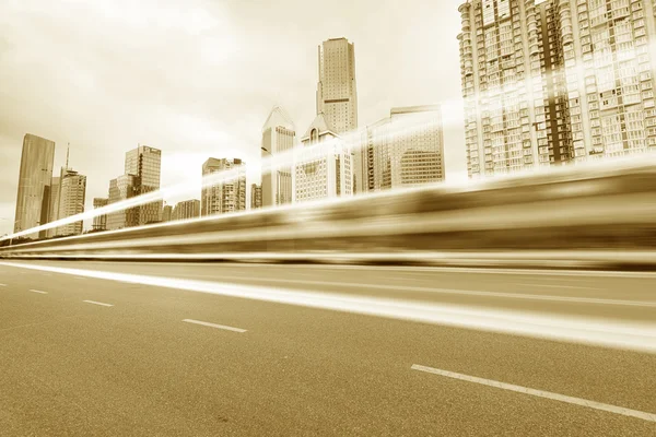 Light trails on the modern building — Stock Photo, Image