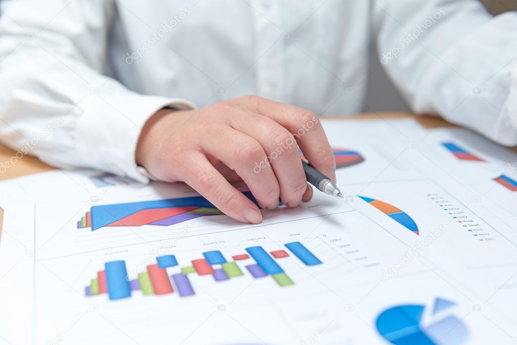 Woman hand with business report