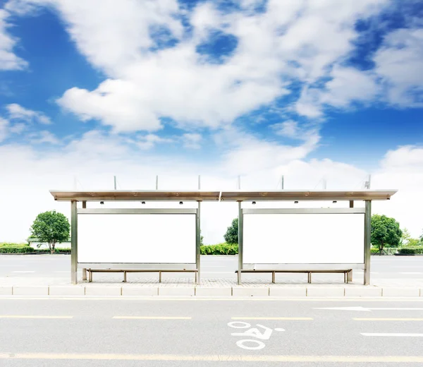 Bus stop with billboards — Stock Photo, Image