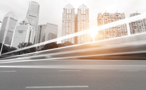 Light trails on the modern buildings — Stock Photo, Image