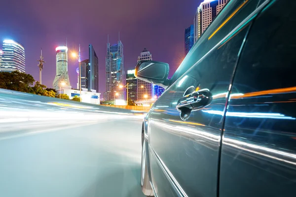 Speeding car at city — Stock Photo, Image