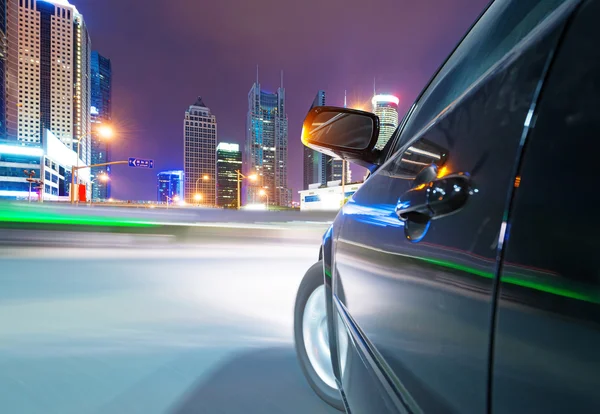 Speeding car at city — Stock Photo, Image