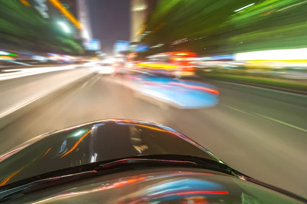 Car on the road with motion blur background — Stock Photo, Image