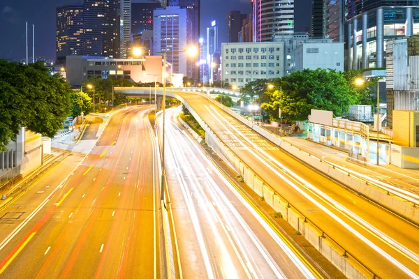 Pohled na noční Hongkong s auto světlo — Stock fotografie
