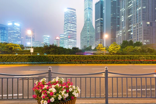 The light trails on the modern buildings background — Stock Photo, Image