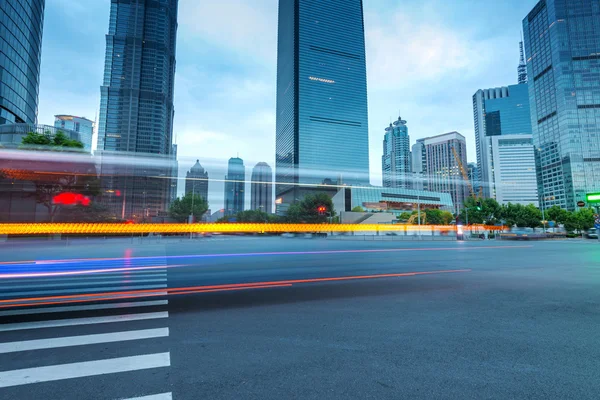 Light trails on the modern building — Stock Photo, Image