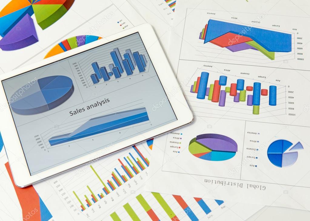 Financial charts with tablet