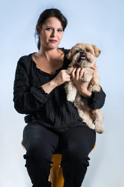 Woman posing with her dog — Stock Photo, Image