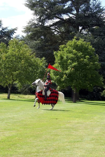 Knight riding a horse — Stock Photo, Image