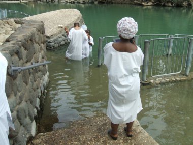 Christians baptizing in the Yardenit Baptismal Site, Israel, Middle East clipart