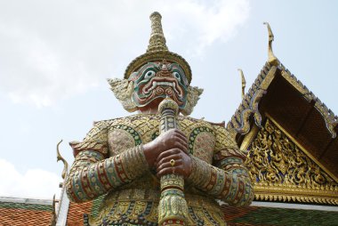 Golden guardian statue, Wat Phra Kaew, The Grand Palace, Bangkok, Thailand clipart
