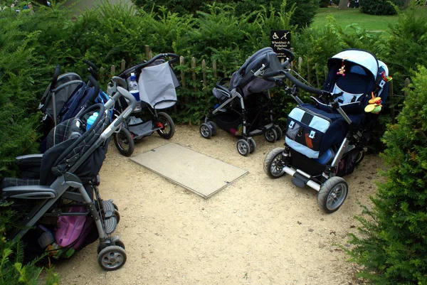 Children buggies in parking area — Stock Photo, Image