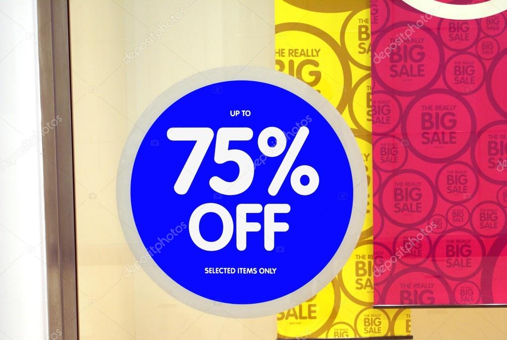 Sale sign. store's window sale sign. up to seventy five percent off selected items only.