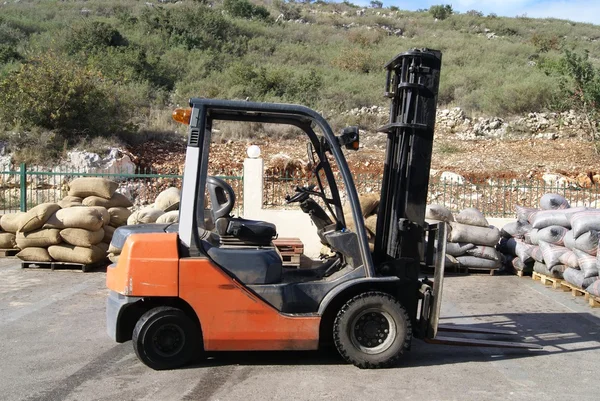 Forklift truck in a factory or a warehouse. — Stock Photo, Image