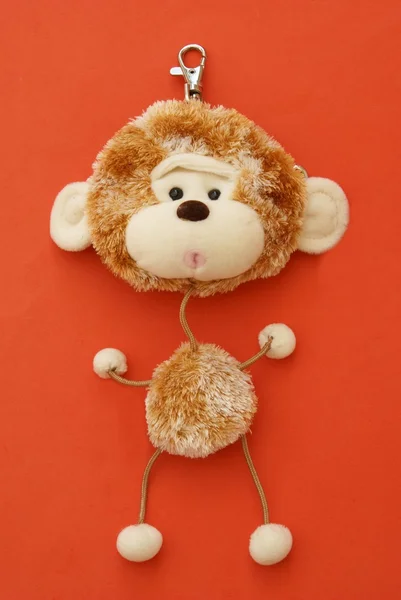 Nyckelhållare. tyg apan nyckelhållare. Monkey nyckelhållare. — Stockfoto