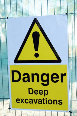Tehlike derin kazı işareti. uzak tutun.