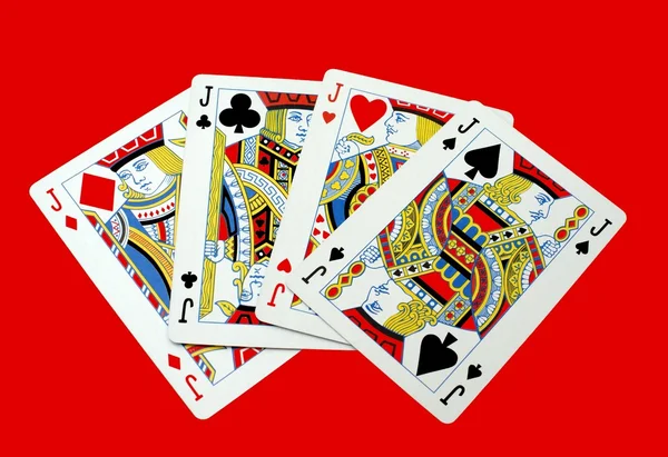 Jogar às cartas. Cartões Jack de todos os quatro naipes . — Fotografia de Stock