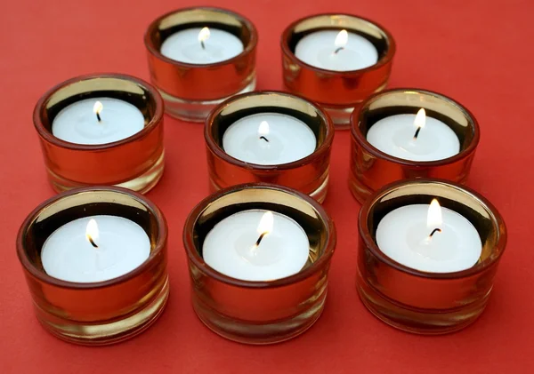 Conjunto de velas acesas — Fotografia de Stock