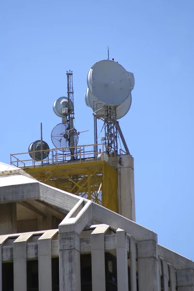 Satellite dishes on a roof — Stock Photo, Image