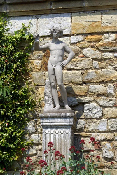 Italian statue in the Italina garden of Hever castle, Kent, England