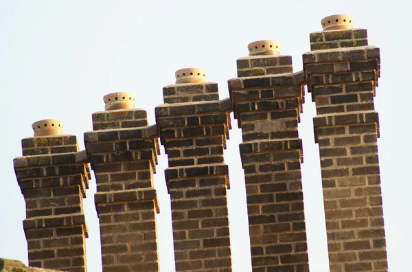 Old chimneys. chimney stacks and chimney pots — Stock Fotó