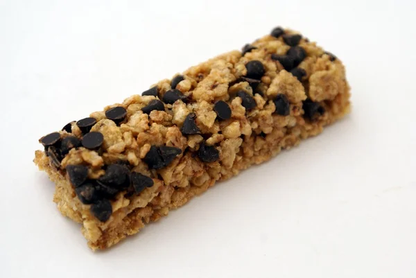 Barretta di cereali con riso, frumento e cioccolato. barretta di cereali. barretta di granola. granola — Foto Stock